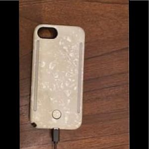 LuMee light up phone case with cord.
